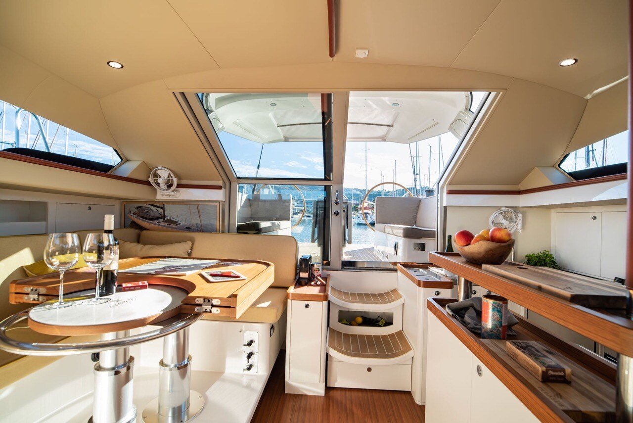 Sail Magazine published article on Pegasus 50 using this photo of the yachts interior, saloon with gimbaled settee and view to the cockpit.