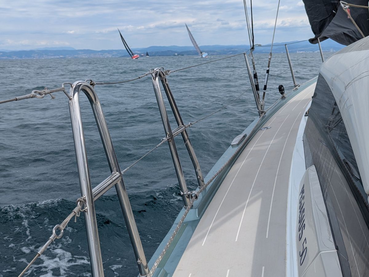 Two Pegasus 50 boats sailing by another Pegasus 50